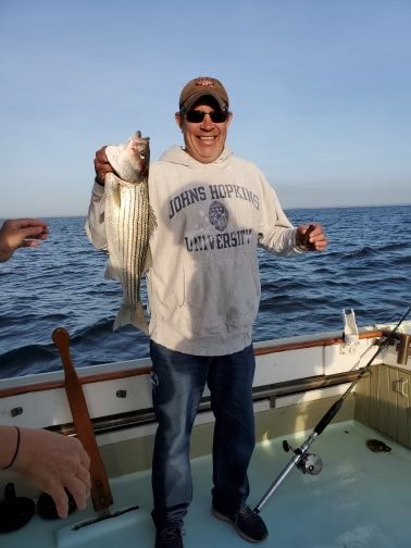 Aaron fishing on the water